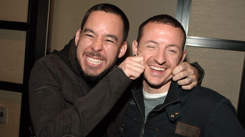 Happy Mike Shinoda pulling Chester Bennington's cheeks